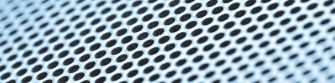 Close-up view of metallic mesh or grid surface.