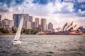 City of Sydney Cityscape with Opera House and Sailing Boat
