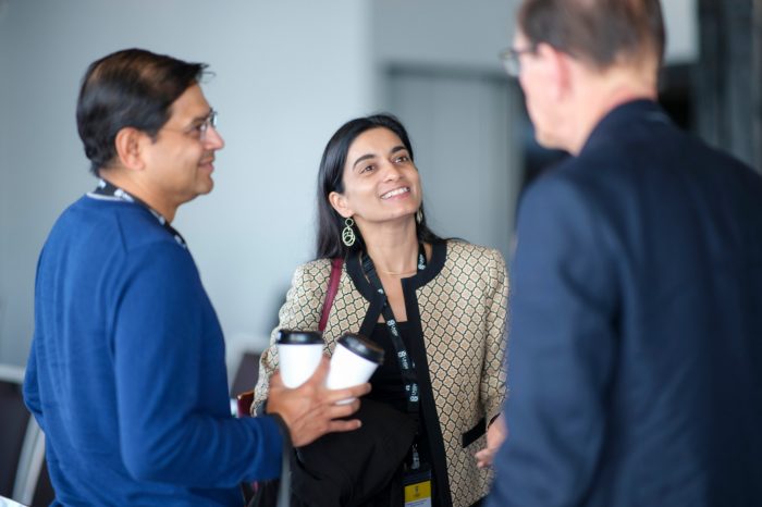 Individuals networking at event