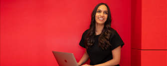 Student with red background
