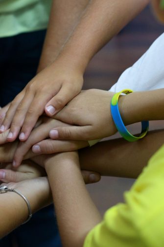 close up of hands inside a circle
