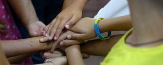 close up of hands inside a circle