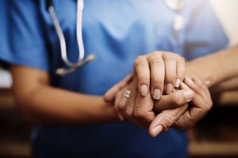Doctor holding hands Submit a Poster