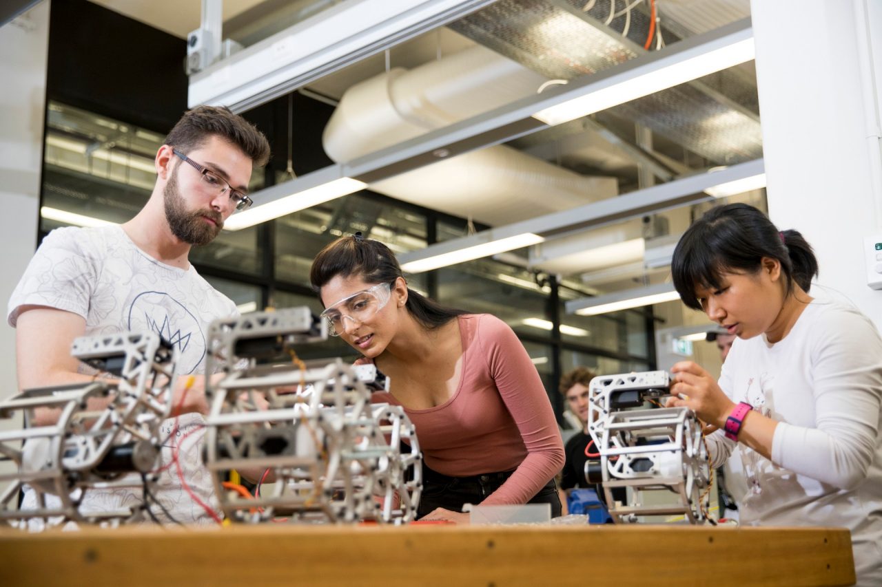 Students studying in engineering lab